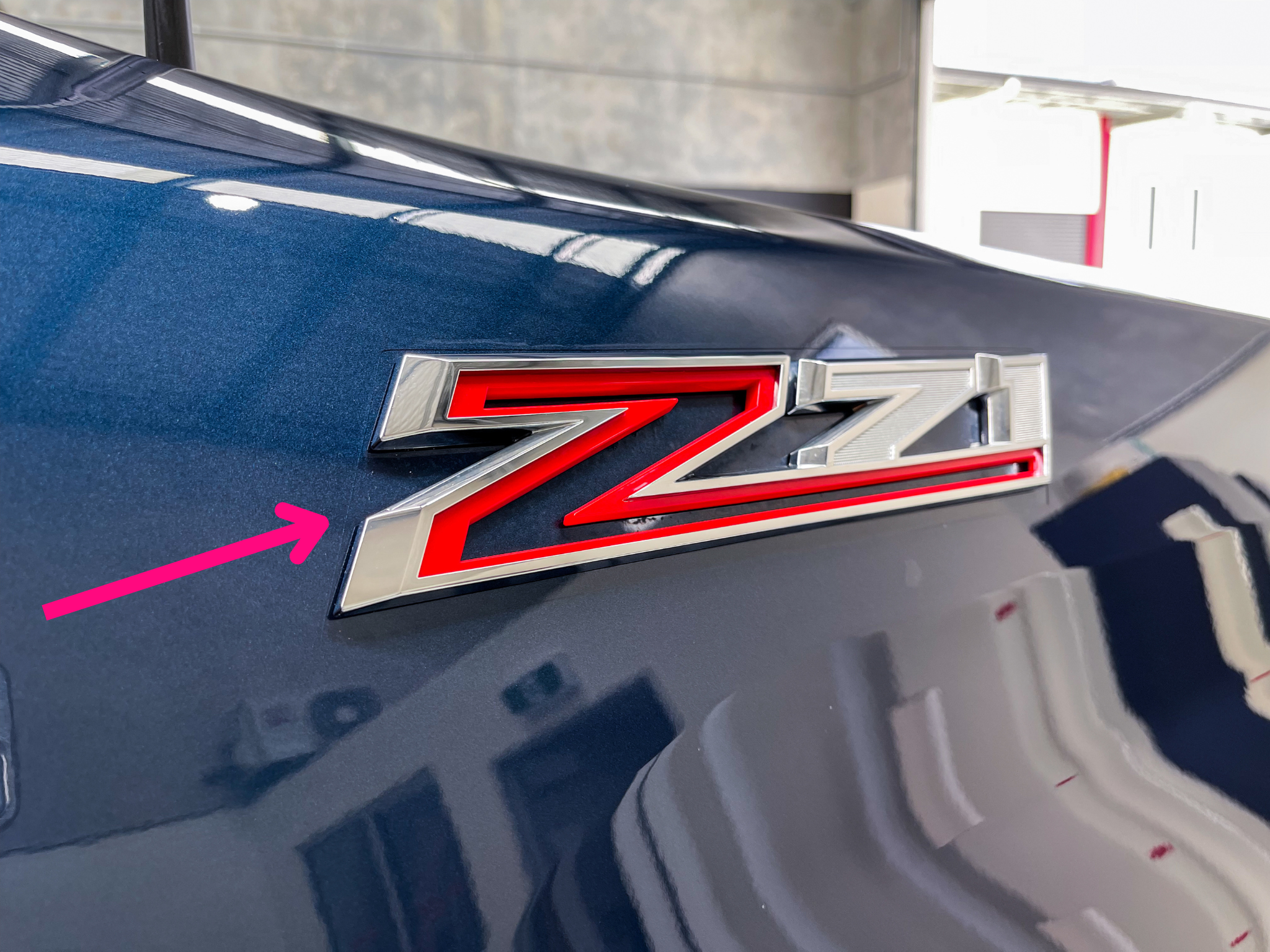 Close up displaying edge of film on fender Z71 badge